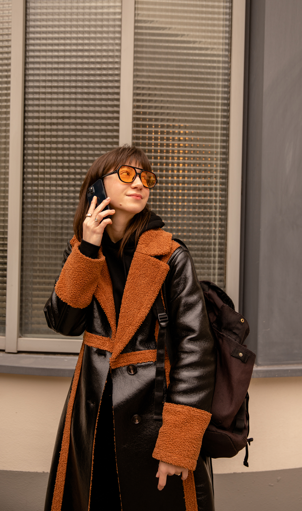 Shearling aviator jacket with soft trim, buttoned front, and practical side pockets
