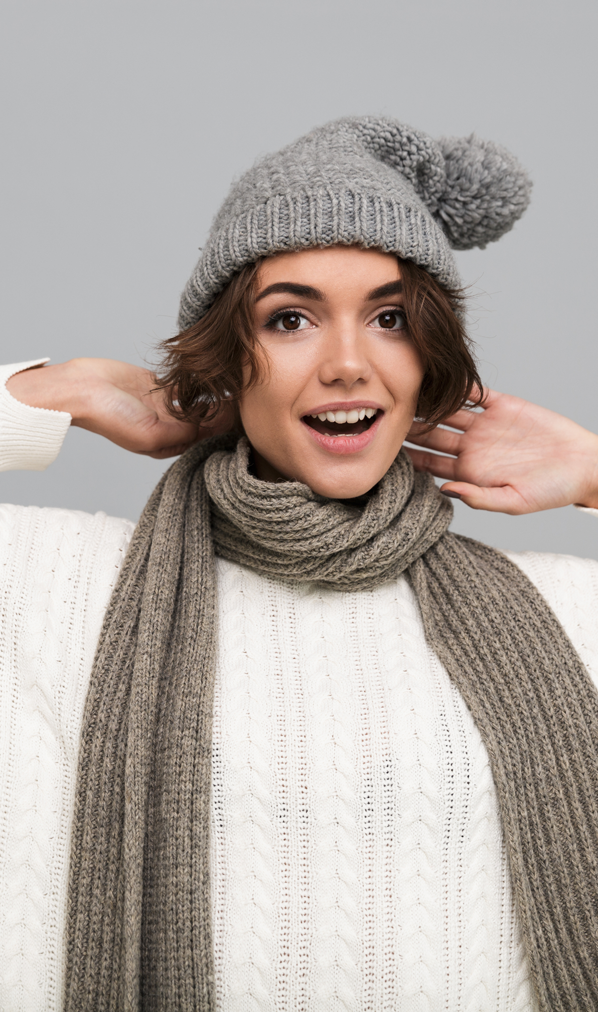 Chunky knit muffler with soft ribbed texture, generous length, and easy wrap styling