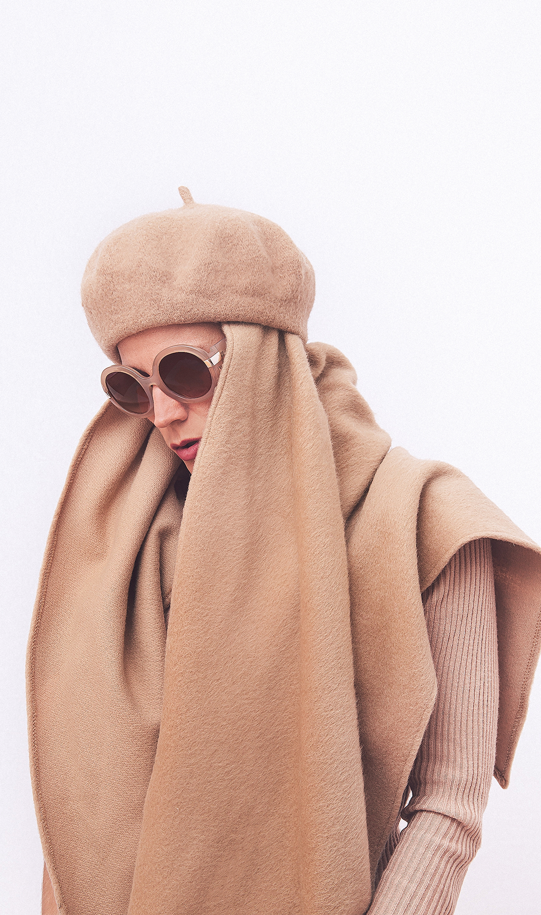 Oversized winter muffler with soft texture, generous coverage, and effortless wrap styling